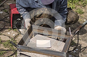 A professional welder looks at how to properly weld parts by electric welding