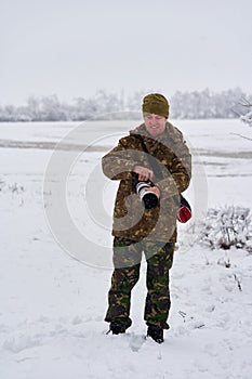 Professional wildlife photographer in the winter