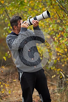 Professional wildlife photographer at work