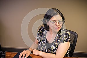 Professional Woman Busy At Work Using Computer