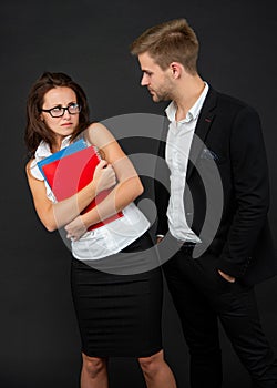 Professional woman feeling disgust being sexually harassed by man colleague, harrassment.