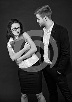 Professional woman feeling disgust being sexually harassed by man colleague, harrassment.