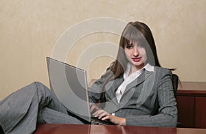 professional woman on a laptop