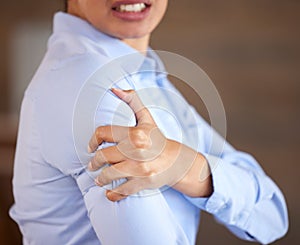 Professional woman with shoulder pain, hand on injury and closeup with medical problem, muscle tension and hurt. Health