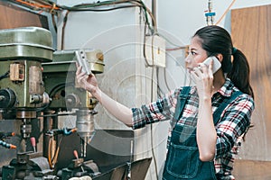 Professional woman worker looking at components