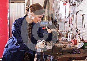 Professional woman worker during work in workshop