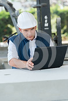 professional worker looking at laptop