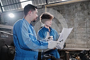 Professional workers teams work in the metalwork manufacturing factory