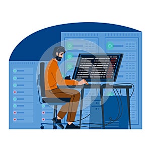 System administrator programming code in a server room