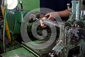 Professional works, the milling process for metal parts, metal machinery in large industrial plants-image