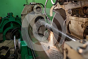 Professional works, the milling process for metal parts, metal machinery in large industrial plants-image