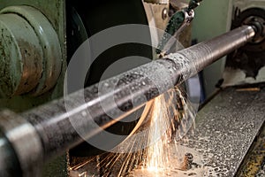 Professional works, the milling process for metal parts, metal machinery in large industrial plants-image