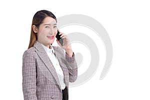 Professional young Asian business woman in formal suit with white shirt is use smartphone to calling telephone to check data while