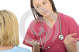 Professional Young Female Doctor Having A Conversation With A Patient