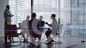 Professionals at work: business team discussing financial strategies in a crisis while sitting at desk