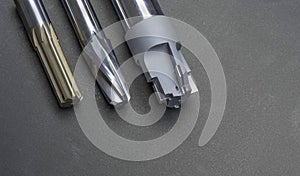 professoinal multi cutting tools special set. drill, endmill, cutter. Material carbide. Used for metalwork. Isolated on dark