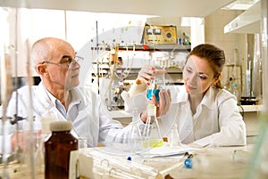 Professor and his assistant in the laboratory