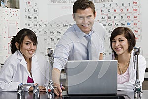Professor With Students In Science Class