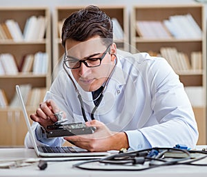 Proffesional repairman repairing broken hard drive