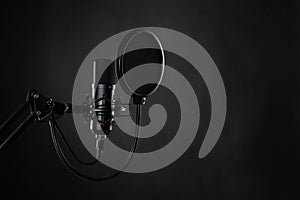 Proffesional studio microphone, isolated on the black background