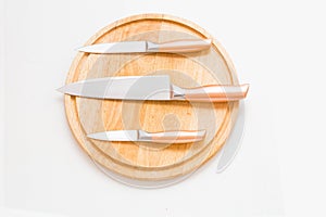 Proffessional chef knifes on the cutting table.