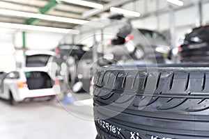 Profil of car tyre in the car repair workshop - closeup photo