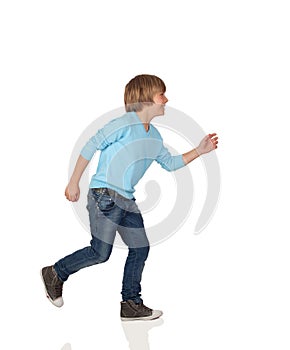 Profile of adorable preteen boy walking