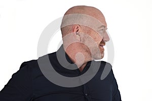 Profile of bald man on white, smiling photo