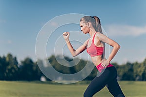 Profile cropped photo of young lady athlete, running outdoors, t