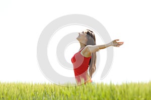 Profile of a girl breathing fresh air in a field