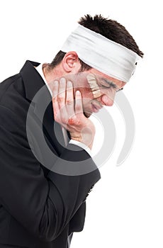 Profile of man with bandage over head
