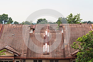 Profile of old roof tiles with leakage on residential house