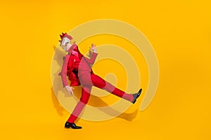 Profile photo of disco entertainer dance have fun wear rooster polygonal mask red tux isolated yellow color background