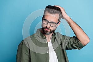 Profile photo of intelligent virile cool guy enjoy new haircut wear green shirt isolated blue color background