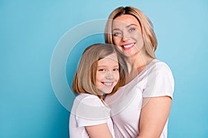 Profile photo of two people beautiful mommy lady small little daughter blonds hugging good mood best friends wear casual