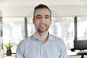 Profile picture of Caucasian male employee posing in office photo