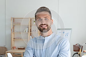 Profile picture of smiling Caucasian male employee
