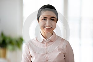 Profile picture of smiling Indian female employee