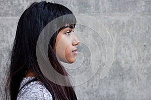 Profile portrait of beautiful young Indian woman