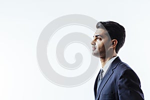 Profile portrait of a handsome man in suit