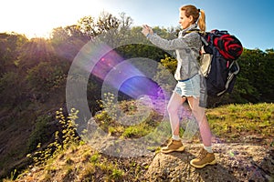 Profile portrait of happy sporty woman traveler. Female model do