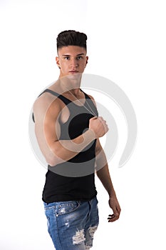 Profile portrait of trendy young man with tank top