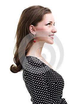 Profile portrait of young smiling woman, isolated on white