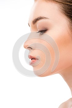 profile portrait of young woman with clean fresh skin