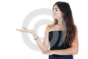 Profile pretty young woman showing hand blank copy space isolated in copyspace white background