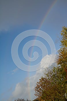 Profile of rainbow during storm Brian in UK photo