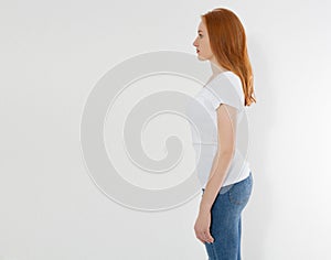 Profile of Red hair young firl with healthy posture  on white background. Back and body csre. Beauty and health concept.