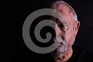 Profile Of Senior Man With Scraggly Beard