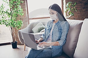 Profile side photo of focused girl manager corona virus infection patient quarantine work home use laptop read document photo