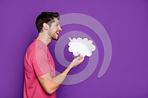 Profile side photo of positive cheerful guy hold white paper card cloud share private confidential advertising secret